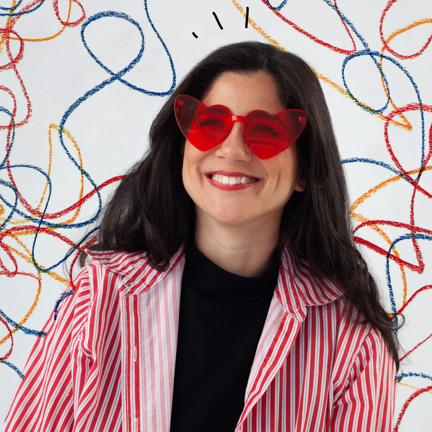 Portrait of woman wearing heart shaped glasses 